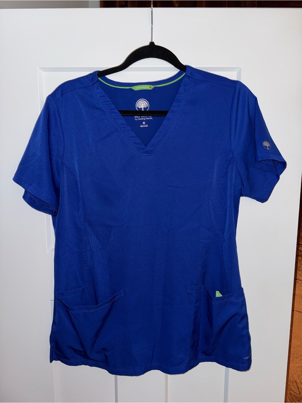 Blue healing hands top